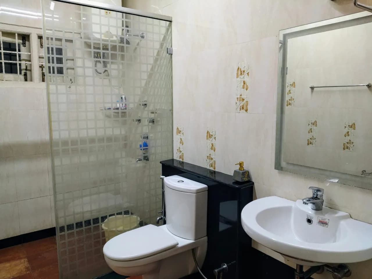 Bathroom with glass shower and washbasin